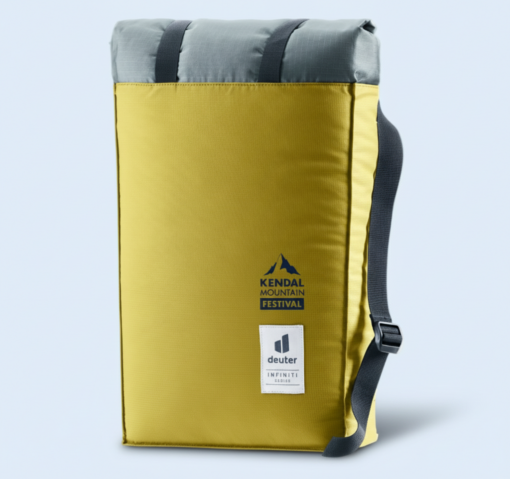 Tumeric and gray backpack with Kendal Mountain Festival and Deuter logos on a white background